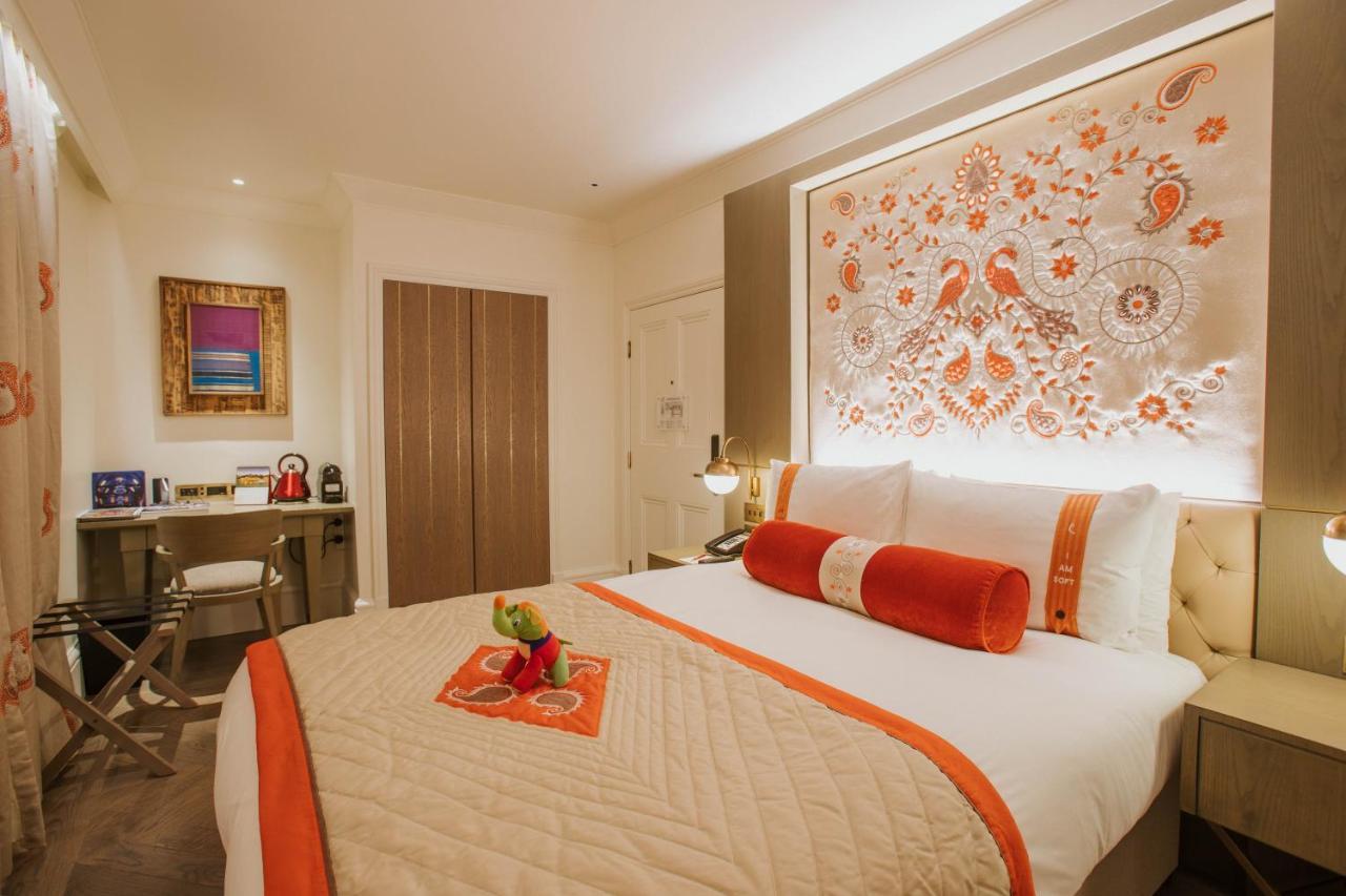 The Lalit London Otel Dış mekan fotoğraf A bedroom at The Taj Mahal Palace, Mumbai